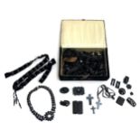 A velvet jewellery box containing a quantity of loose Victorian jet beads, necklace in need of