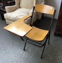 A folding lecture theatre chair