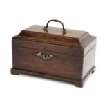 An 18th century mahogany tea caddy, c.1760, cavetto moulded lid opening to a later converted