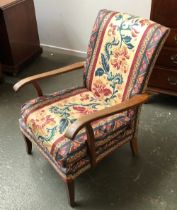 A Parker Knoll model 717 oak open armchair, 62cmW