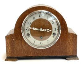 An Enfield oak cased domed mantel clock, 30cmW