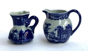 Two Victoria ware jugs in blue and white Ironstone Willow pattern