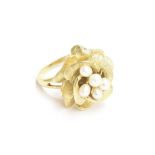 A heavy 14ct gold ring in the form of a rose, set with a cluster of pearls, size M, 13.5g
