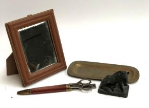 A small leather frame with bevelled mirror plate, 24x19cm together with a La Cross, Schnefel Bros,