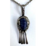 A Danish Dansk Smykkekunst brutalist white metal and sodalite pendant on chain, marked D.S