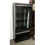 A black stained display cabinet, 76cmW