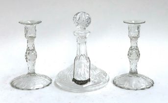 A pair of hand blown cut glass candlesticks (chips), domed spreading foot, 25.5cmH; together with