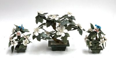 Three decorative hardstone flower in pot ornaments