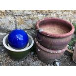 A pair of ceramic planters, 37cmD, together with 2 other planters and a decorative orb