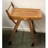 A mid century hostess trolley on large casters, 66cmH