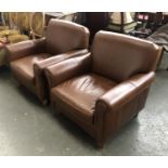A pair of brown leather armchairs, 87cmW