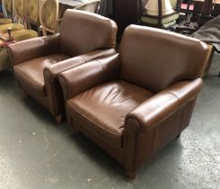 A pair of brown leather armchairs, 87cmW