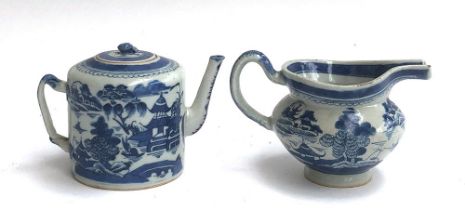 A small Chinese export blue and white teapot, entwined bifurcated handle, 11.5cmH; together with a