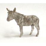 A silver figurine of a donkey, hallmarked SMD, London, 1972, 5.5cmH, 90.4g