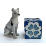 Two Royal Copenhagen items - Dog Z189 and candleholder.