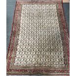 A dense floral ground rug, 271x186cm