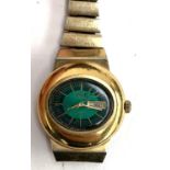 A vintage 1970s Seiko Automatic Hi-Beat 2706-7020 wristwatch, green dial, Arabic day/date, in