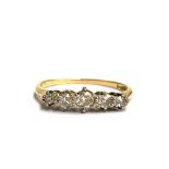 An 18ct gold diamond five stone ring, size M, 1.8g