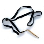 A Wahl Eversharp gold filled propelling pencil on a black silk lanyard