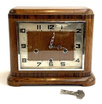 A vintage Enfield oak cased mantel clock, with key, 27.5cmW