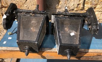 A pair of black painted outdoor lanterns, approx. 47cmH