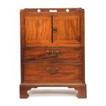 A George III mahogany tray top commode, the gallery with pierced handles and quatrefoils, over
