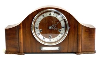 A 1950s oak cased mantel clock, bearing silver presentation plaque engraved 'Presented by Y Divn.