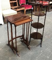 A three tier folding cake stand; together with a nest of two Regency style tables, the larger 65cmH