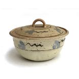 A studio pottery lidded bowl, with blue flower pattern, marked to base 'BSP', 20.5cmD