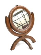 A 19th century treen circular folding shaving mirror, approx. 21cmH