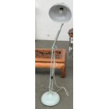 A large pale blue anglepoise floorstanding lamp