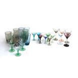 A quantity of vintage coloured glass: five martini glasses with twisted stems; tumblers etc