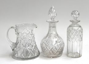 A Stuart crystal cut glass decanter, 27cmH; together with a further decanter and cut glass jug