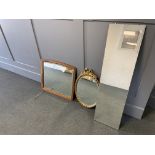 Three mirrors: one long mirror with shaped edge, 30.5x112cm; one framed with bevelled plate, 62.5x56