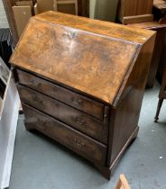 A George III walnut bureau, fall front opening to a fitted interior with pigeonholes and drawers,