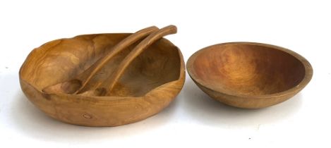An olive wood salad bowl with servers, 37cmW; together with a further turned wooden bowl