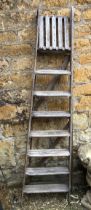 A wooden seven rung stepladder