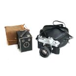 A Kodak Brownie Junior SIX-20 camera in canvas case; together with a Yashika TL Electro X 75mm
