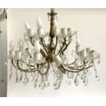 An 18 arm gilt metal and glass chandelier, approx. 64cm wide