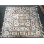 A 20th century rug, pale yellow and orange geometric pattern, approx. 200x200cm