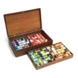 A pine sewing box with removeable tray, containing a large quantity of cotton reels, 38cmW