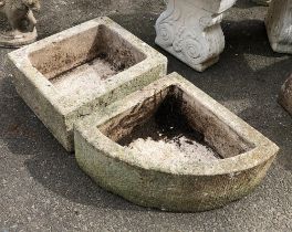A heavy stone planter, 46x40x21cm, together with a similar stone planter in the shape of a quadrant,