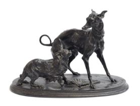 After Pierre-Jules Mene (French, 1810-1894), a patinated bronze figure group of a whippet and a King