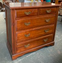 An early 20th century mahogany chest, two short over three long drawers, on bracket feet,