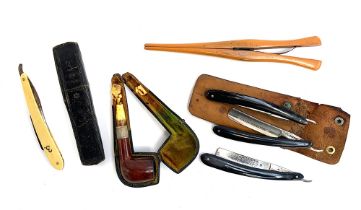 A quantity of early 20th century cut throat razors, to include two German Solingen 'The Hamburg