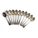 A set of six silver teaspoons, with crossed golf club terminals, Walker & Hall; together with a