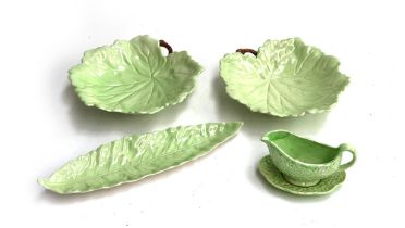 A pair of Carlton Ware leaf dishes with a matching long dish, 36cmL; together with a cabbage ware