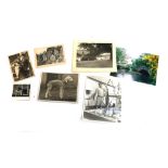 Four black and white fishing interest photographs; together with a still of a Bedlington Terrier