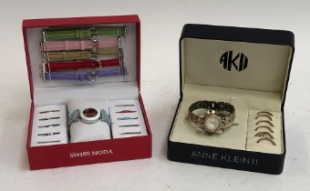 A Swiss Moda watch with interchangeable bezels and straps, boxed; together a boxed Anne Klein II