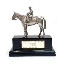 A cast silver trophy un the form of horse with jockety up, by Wakely & Wheeler, London 1983, the